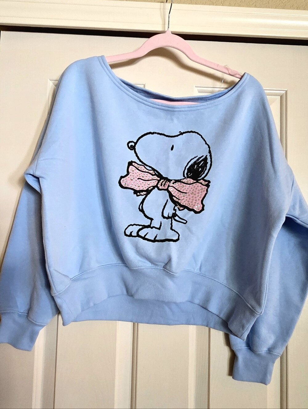 Peanuts Light Blue Snoopy Sweatshirt with Pink Bow Graphic